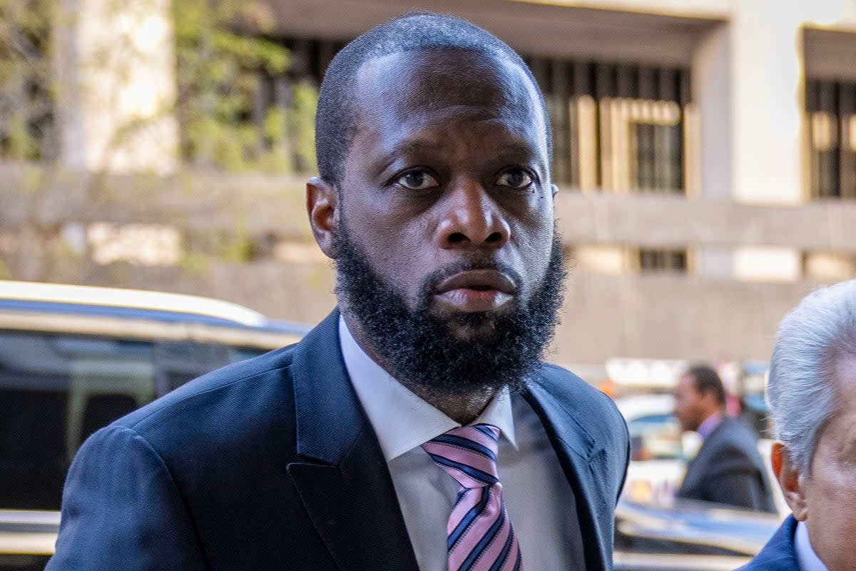 Prakazrel "Pras" Michel,  a member of the 1990s hip-hop group the Fugees arrives at federal court   (AP)