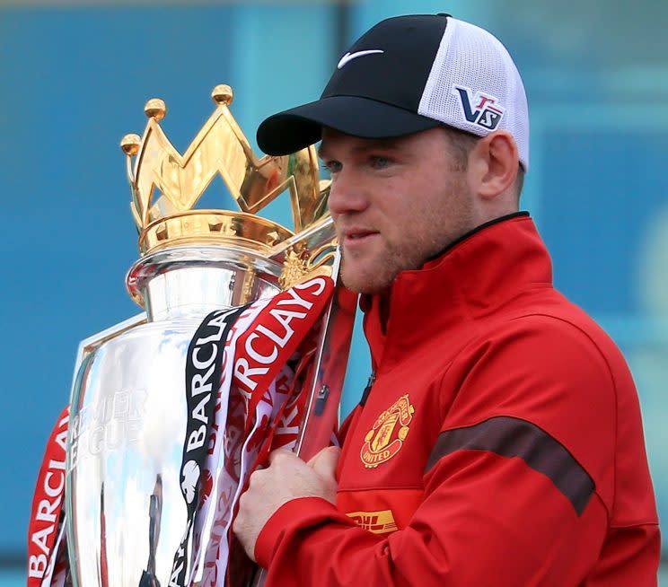 Glory: Wayne Rooney with the Premier League trophy