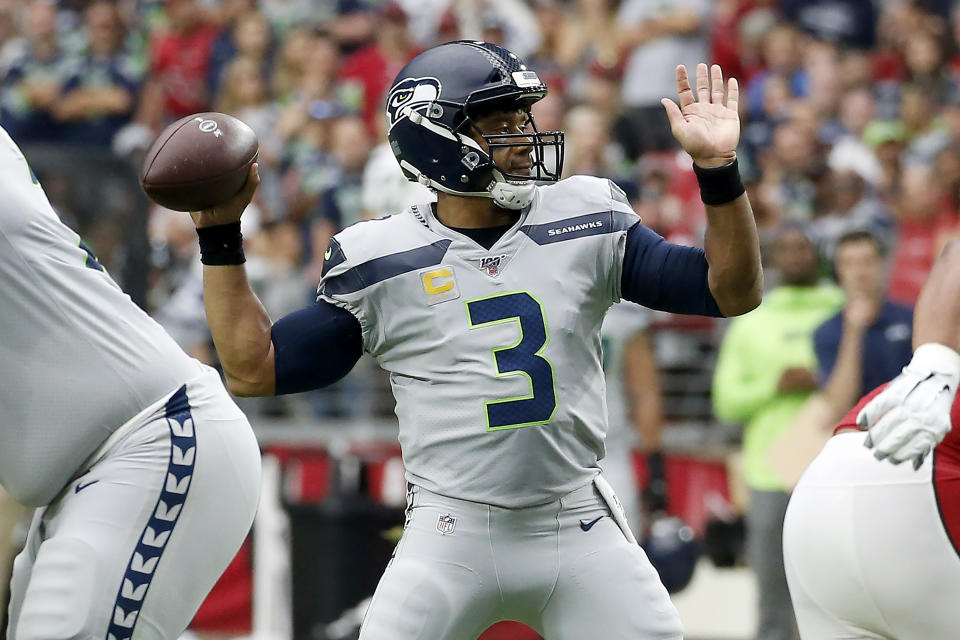 Seattle Seahawks quarterback Russell Wilson (3) throws against the Arizona Cardinals during the first half of an NFL football game, Sunday, Sept. 29, 2019, in Glendale, Ariz. (AP Photo/Ross D. Franklin)