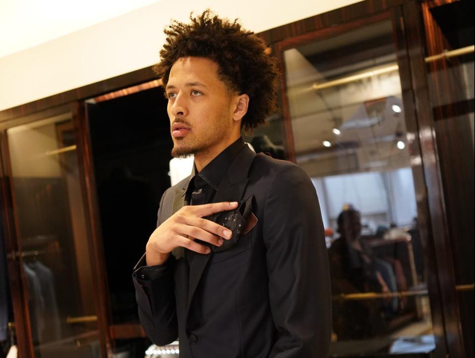 Cade Cunningham getting dressed at Neiman Marcus for the 2021 NBA Draft - Credit: Gonzalo Feo