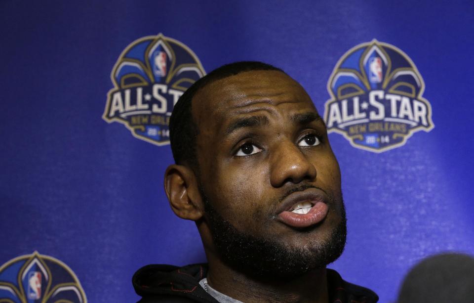The Miami Heat's LeBron James speaks with reporters during the NBA All Star basketball news conference, Friday, Feb. 14, 2014, in New Orleans. (AP Photo/Gerald Herbert)