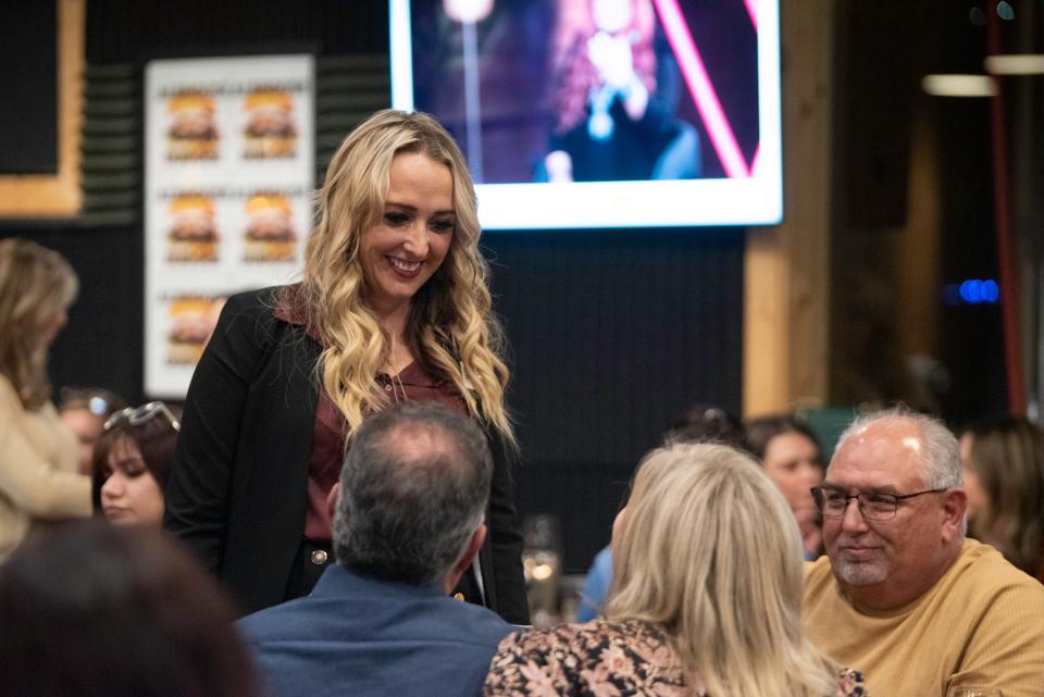 Pueblo mayoral candidate Heather Graham speaks with supporters during her election night watch party at Brues Alehouse on Tuesday, November 7, 2023.