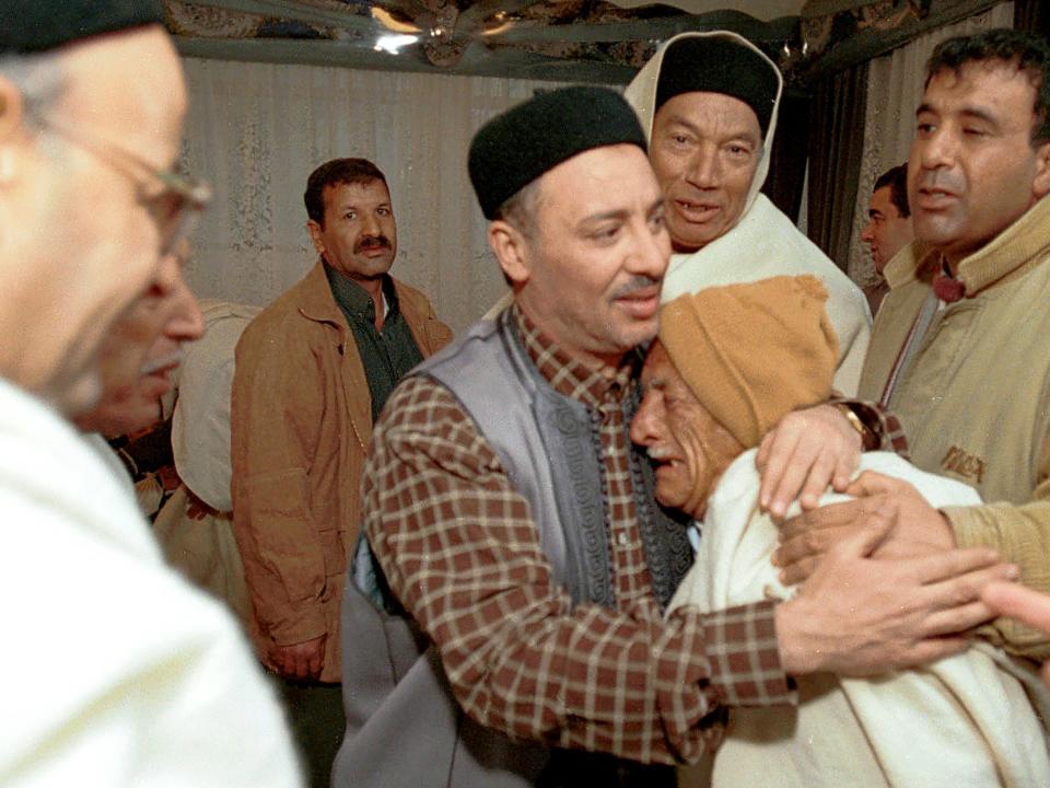 ockerbie bombing defendant Al-Amin Khalifa Fhimah, center, receives visitors on February 2, 2001