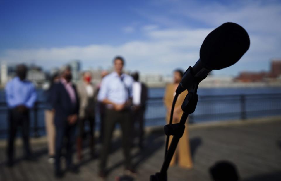 A microphone in front of Justin Trudeau.