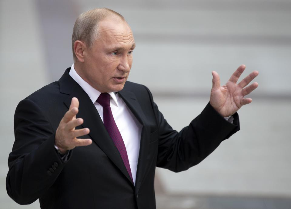 Russian President Vladimir Putin gestures answers a journalist's question after his annual call-in show in Moscow, Russia, Thursday, June 20, 2019. Putin hosts call-in shows every year, which typically provide a platform for ordinary Russians to appeal to the president on issues ranging from foreign policy to housing and utilities. (AP Photo/Alexander Zemlianichenko)