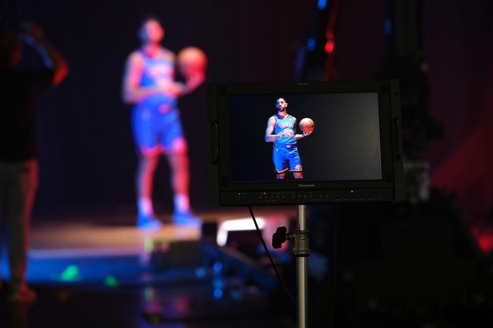 New Thunder guard Vasilije Micic (29) poses at a video station during NBA media day Monday inside Oklahoma City Convention Center.