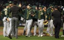 Jul 14, 2018; San Francisco, CA, USA; Oakland Athletics players cerebrate their 4-3 win over the San Francisco Giants at AT&T Park. Mandatory Credit: D. Ross Cameron-USA TODAY Sports