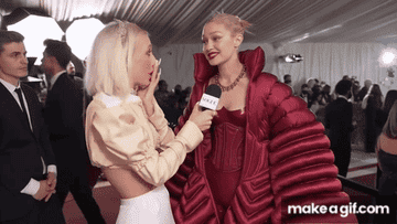 Gigi saying "Big slay" while being interviewed on the red carpet