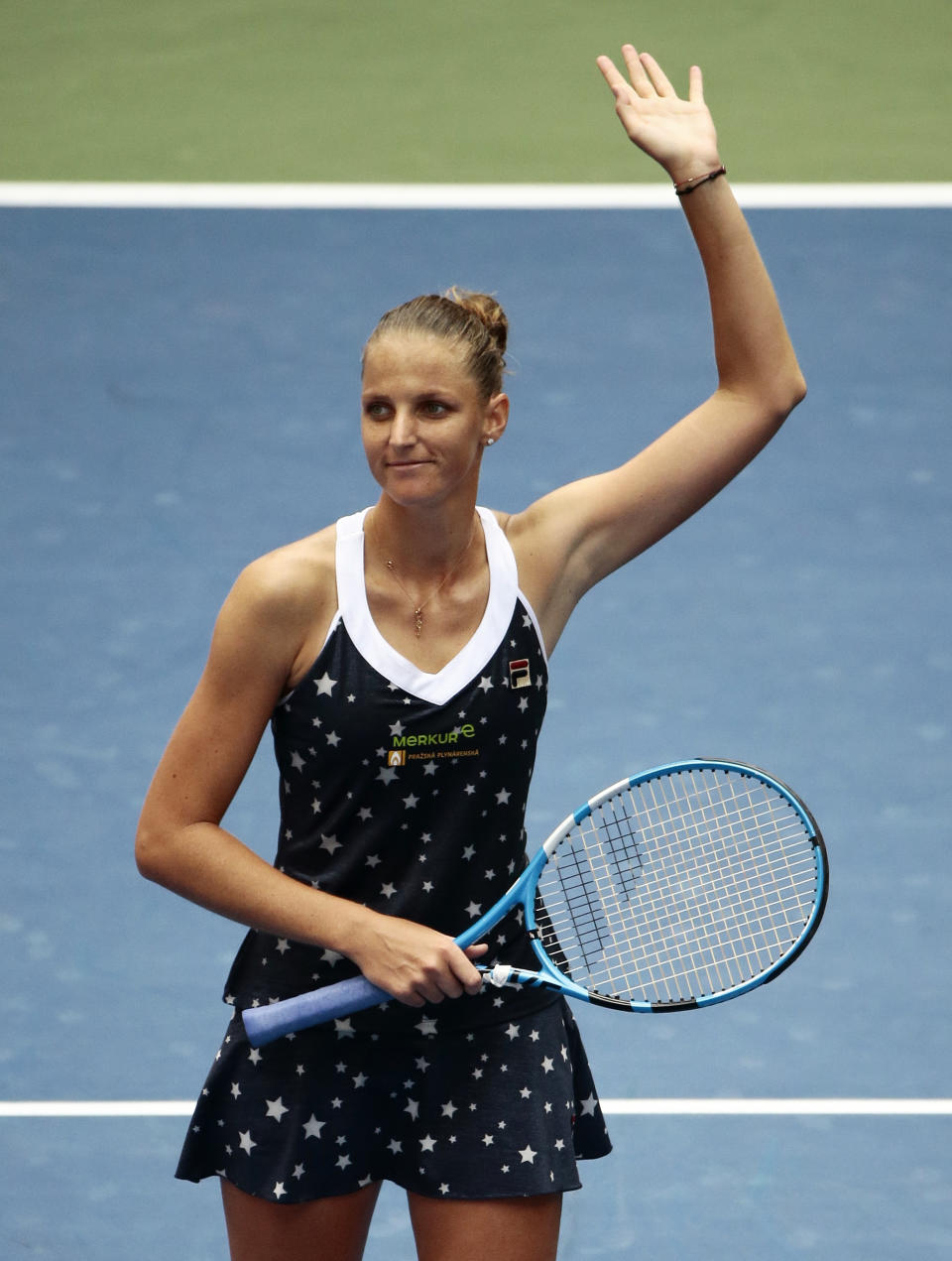 Karolina Pliskova, of the Czech Republic, waves to fans after defeating Ashleigh Barty, of Australia, in the fourth round of the U.S. Open tennis tournament, Sunday, Sept. 2, 2018, in New York. (AP Photo/Andres Kudacki)