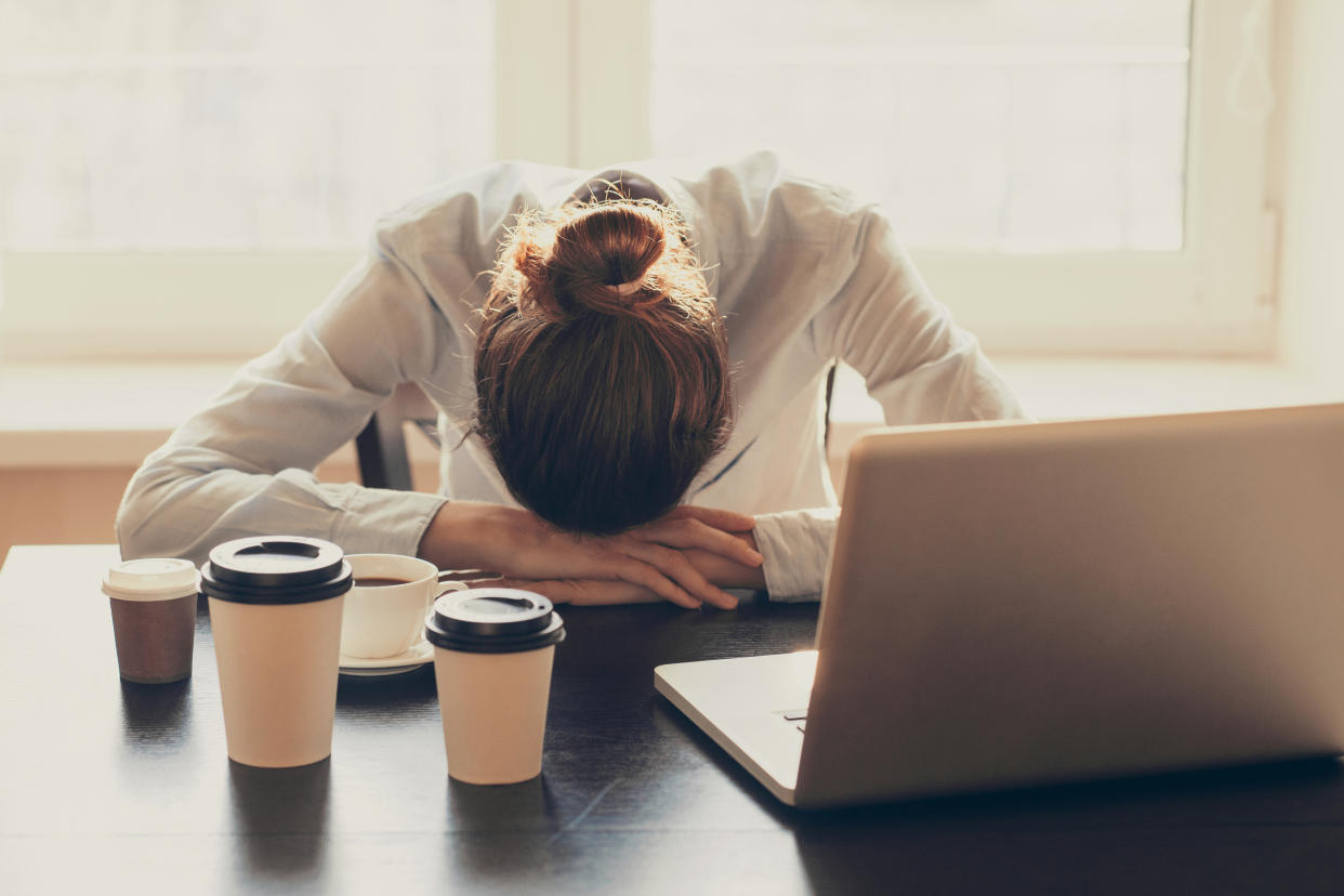 Tired woman in the office