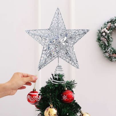 This suitably shimmery silver star topper