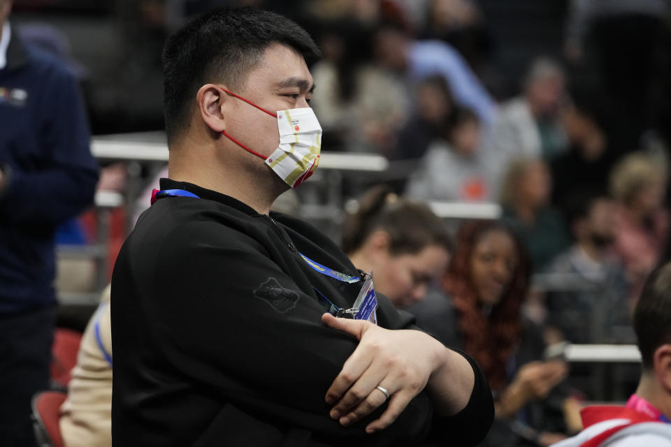 China's former NBA player Yao Ming watches the United States versus China women's Basketball World Cup in Sydney, Australia, Saturday, Sept. 24, 2022. (AP Photo/Mark Baker)