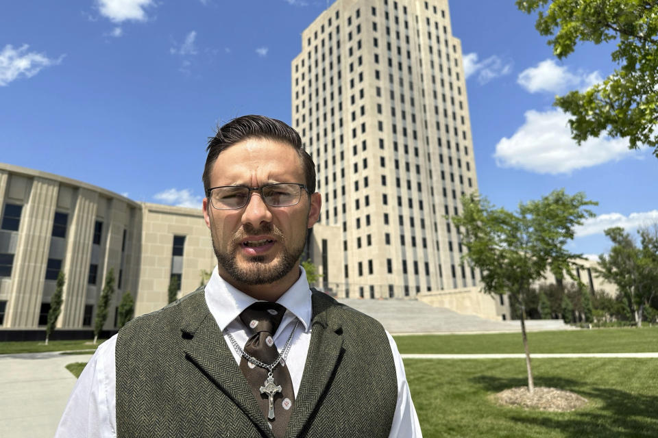 FILE - Burleigh County Auditor Mark Splonskowski poses July 7, 2023, in front of the state Capitol in Bismarck, N.D. Republicans are challenging extended mail ballot deadlines in at least two states in a move that could have severe implications for mail voting nationwide ahead of this year's presidential election. A lawsuit filed last week in Mississippi follows a similar one last year in North Dakota, both brought in heavily Republican states before conservative federal courts. (AP Photo/Jack Dura, File)