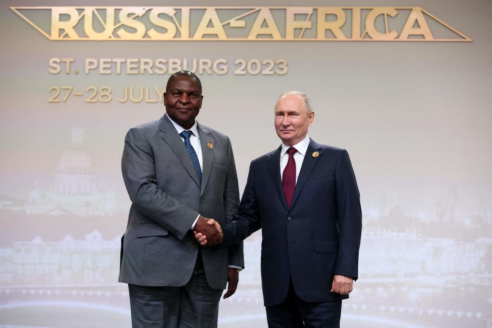 Russian President Vladimir Putin greets Central African Republic President Faustin-Archange Touadera (TASS Host Photo Agency/AFP via G)