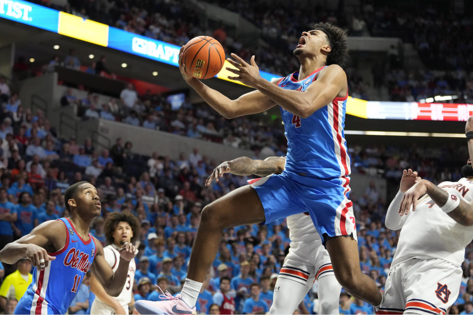 Mississippi forward Jaemyn Brakefield (4) attempts a layup against Auburn during the second half of an NCAA college basketball game, Saturday, Feb. 3, 2024, in Oxford, Miss. (AP Photo/Rogelio V. Solis)