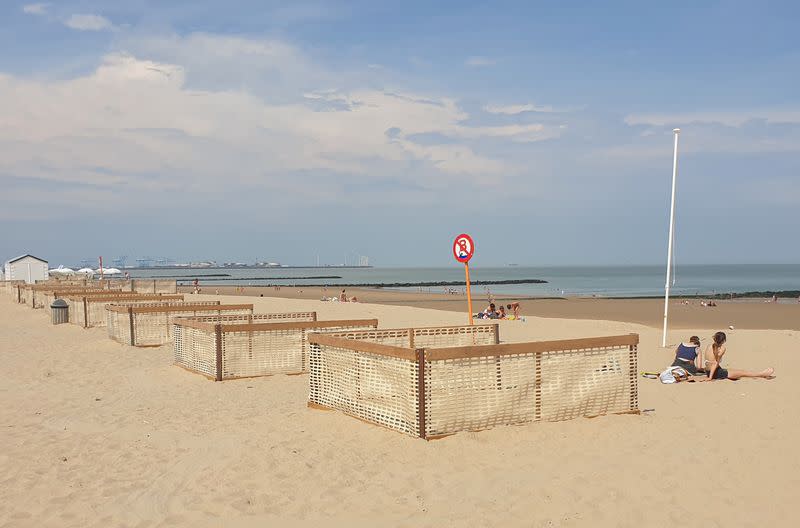 Enclosures are set to ensure social distancing rules on a beach during the coronavirus disease (COVID-19) outbreak, in Knokke-Heist