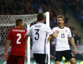 Football Soccer - Germany v Czech Republic - 2018 World Cup Qualifying European Zone - Group C - Hamburg arena, Hamburg, Germany - 8/10/16 Germany's Jonas Hector and Thomas Mueller react REUTERS/Wolfgang Rattay