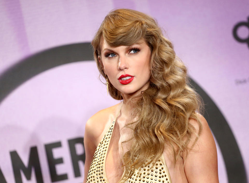 Close-up of Taylor in a studded halter top