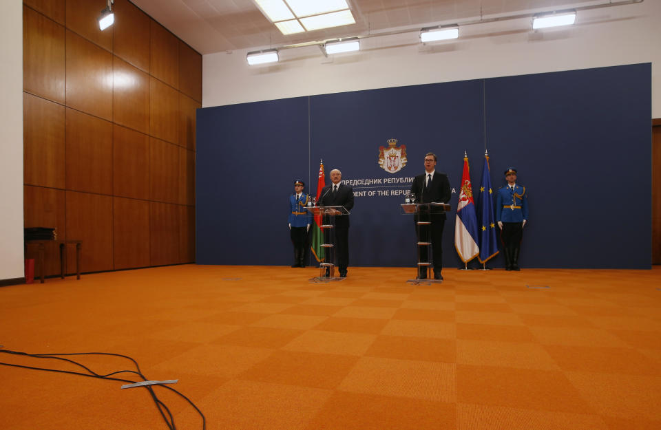 In this photo taken Tuesday, Dec. 3, 2019, Belarus President Alexander Lukashenko, front left, attends a press conference with Serbian President Aleksandar Vucic at the Serbia Palace in Belgrade, Serbia. In a surprise move Thursday Aug. 27, 2020, Serbia has joined the European Union in its rejection of the election results in Belarus that kept the country's longtime leader in power and condemned his crackdown against pro-democracy protesters. (AP Photo/Darko Vojinovic)