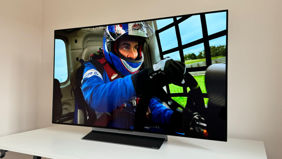 LG C3 OLED TV with a racing driver on screen