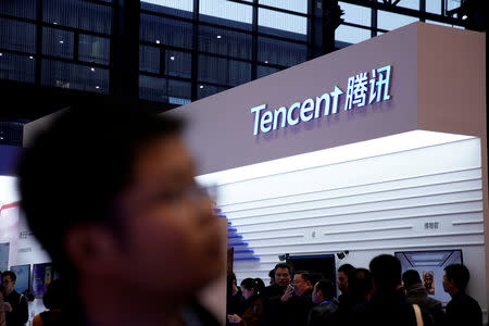 FILE PHOTO: A sign of Tencent is seen during the fourth World Internet Conference in Wuzhen, Zhejiang province, China, Dec. 3, 2017. REUTERS/Aly Song/File Photo