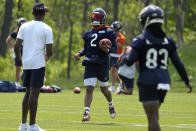 Chicago Bears wide receiver DJ Moore works on the field during NFL football OTA practice in Lake Forest, Ill., Tuesday, May 23, 2023. (AP Photo/Nam Y. Huh)