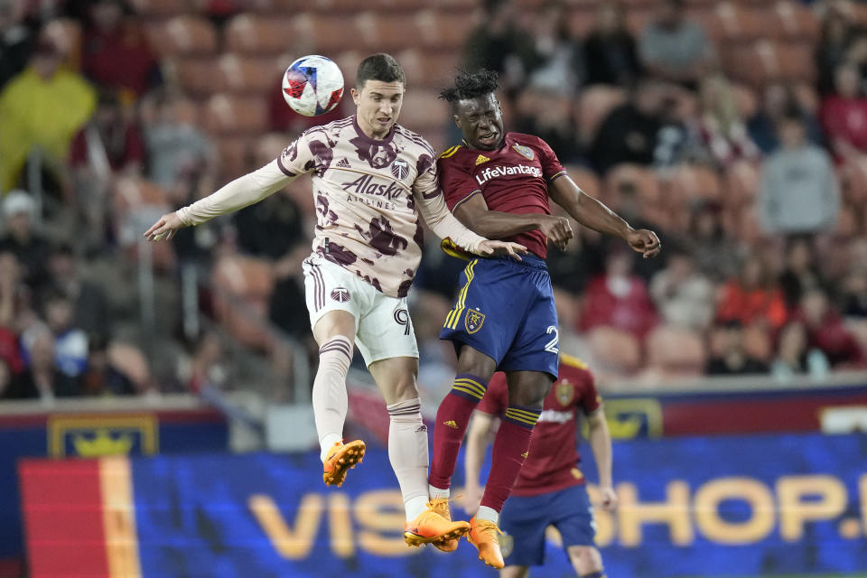 Portland Timbers forward Nathan Fogaca, left, and Real Salt Lake's Emeka Eneli vie for the ball during the second half of an MLS soccer match Wednesday, May 17, 2023, in Sandy, Utah. (AP Photo/Rick Bowmer)