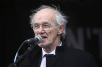 Julian Assange's father John Shipton speaks during a mass protest to support Julian Assange, in London, protesting the Wikileaks founder's imprisonment and extradition, Saturday Feb. 22, 2020. (Isabel Infantes/PA via AP)