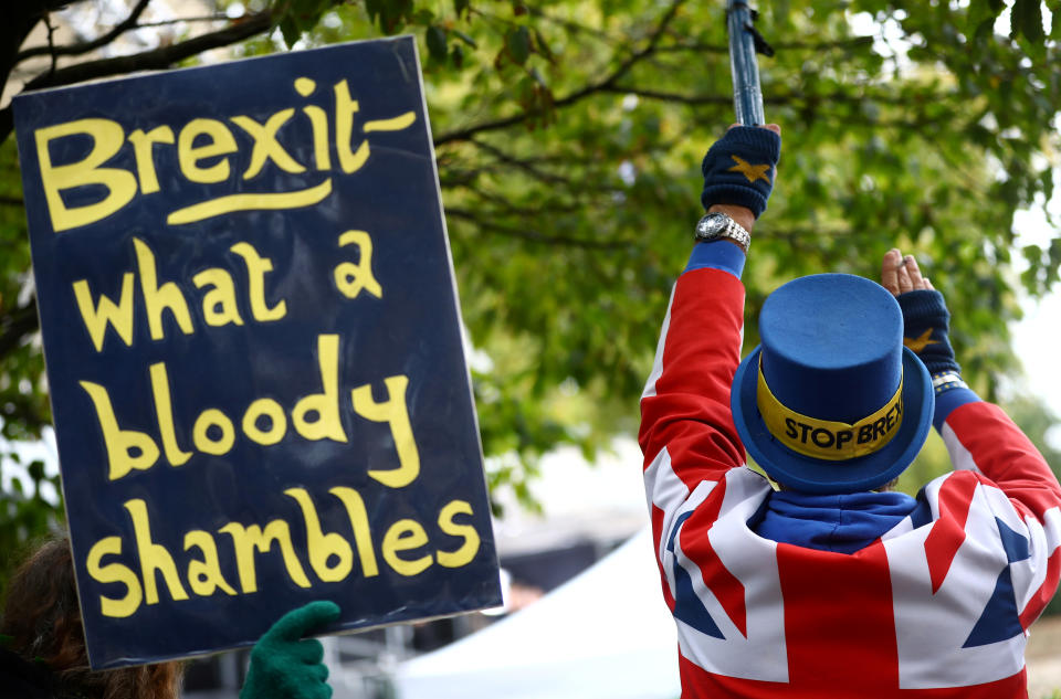 Anti-Brexit protesters demonstrate outside the Houses of Parliament in London, Britain, October 21, 2019. REUTERS/Hannah McKay