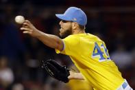 Boston Red Sox's Chris Sale pitches during the first inning of the team's baseball game against the Baltimore Orioles, Friday, Sept. 17, 2021, in Boston. (AP Photo/Michael Dwyer)