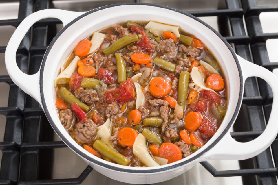 <p>Dash</p><p>Canned tomatoes, carrots and <a href="https://www.yahoo.com/lifestyle/green-bean-casserole-green-beans-141937705.html" data-ylk="slk:green beans;elm:context_link;itc:0;sec:content-canvas;outcm:mb_qualified_link;_E:mb_qualified_link;ct:story;" class="link  yahoo-link">green beans</a> not only add great flavor to this egg noodle <a href="https://www.yahoo.com/lifestyle/141-sensational-soup-recipes-warm-225625664.html" data-ylk="slk:soup;elm:context_link;itc:0;sec:content-canvas;outcm:mb_qualified_link;_E:mb_qualified_link;ct:story;" class="link  yahoo-link">soup</a>, but nourishment to boot.</p><p><strong>Get the recipe: <a href="https://parade.com/341728/dash/beef-and-vegetable-soup/" rel="nofollow noopener" target="_blank" data-ylk="slk:Beef And Vegetable Soup;elm:context_link;itc:0;sec:content-canvas" class="link ">Beef And Vegetable Soup</a></strong></p>