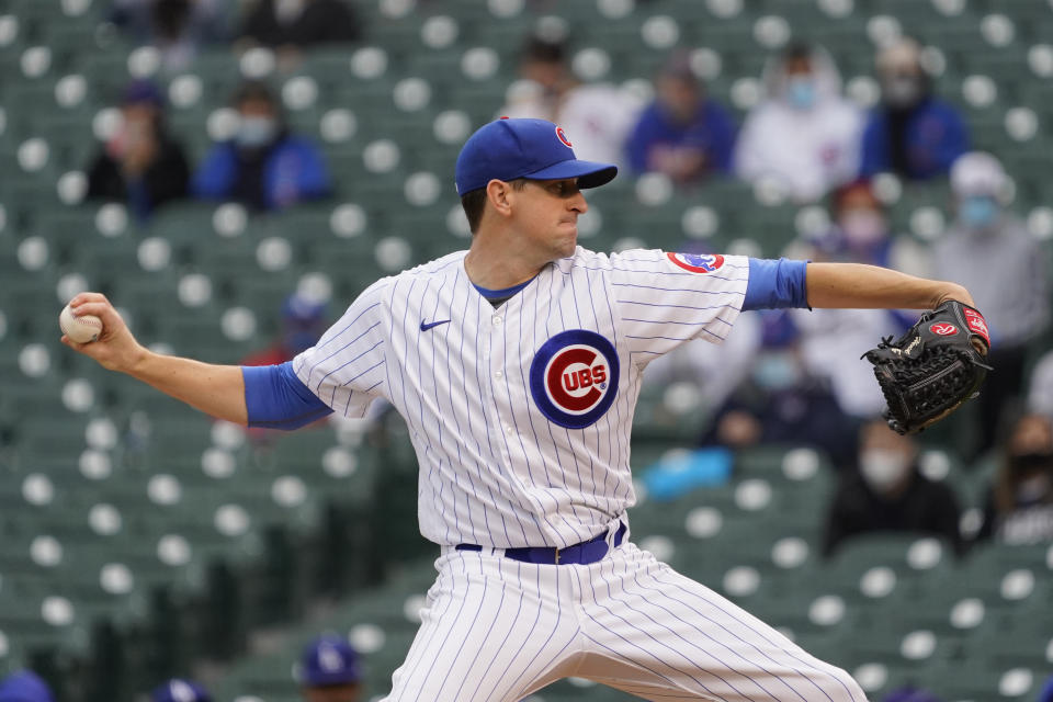 Chicago Cubs starting pitcher Kyle Hendricks throws the ball against the Los Angeles Dodgers during the first inning of the first baseball game of a doubleheader Tuesday, May, 4, 2021, in Chicago. (AP Photo/David Banks)