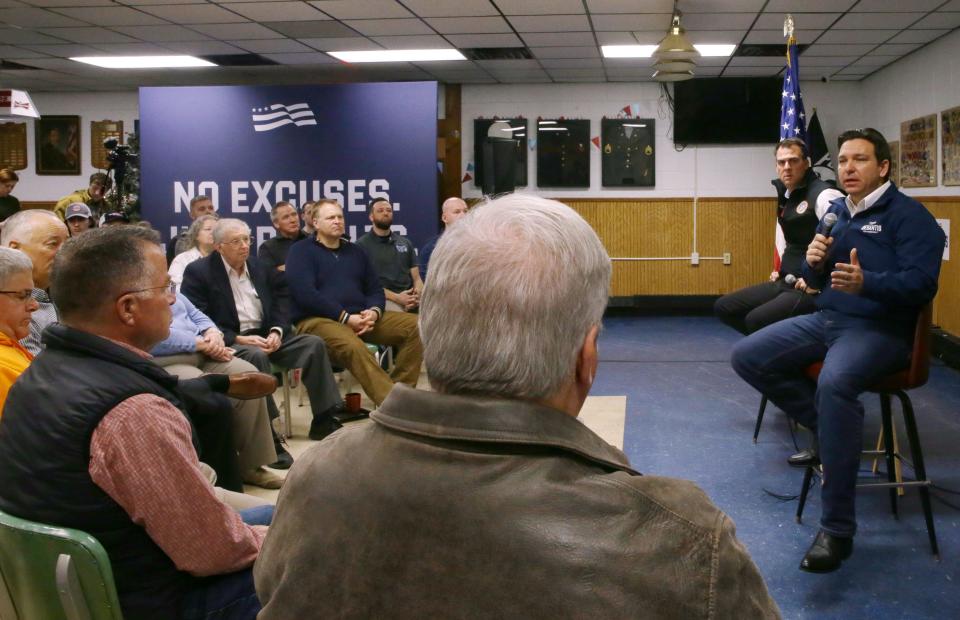 Ron DeSantis speaks to a crowd while campaigning ahead of the caucus Thursday, Dec. 21, 2023 at American Legion Post 721 in Coralville, Iowa.