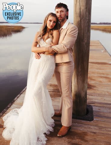 <p>Sydney Breland Photography</p> Halle Kearns and Kelly Roberson pose for wedding photo