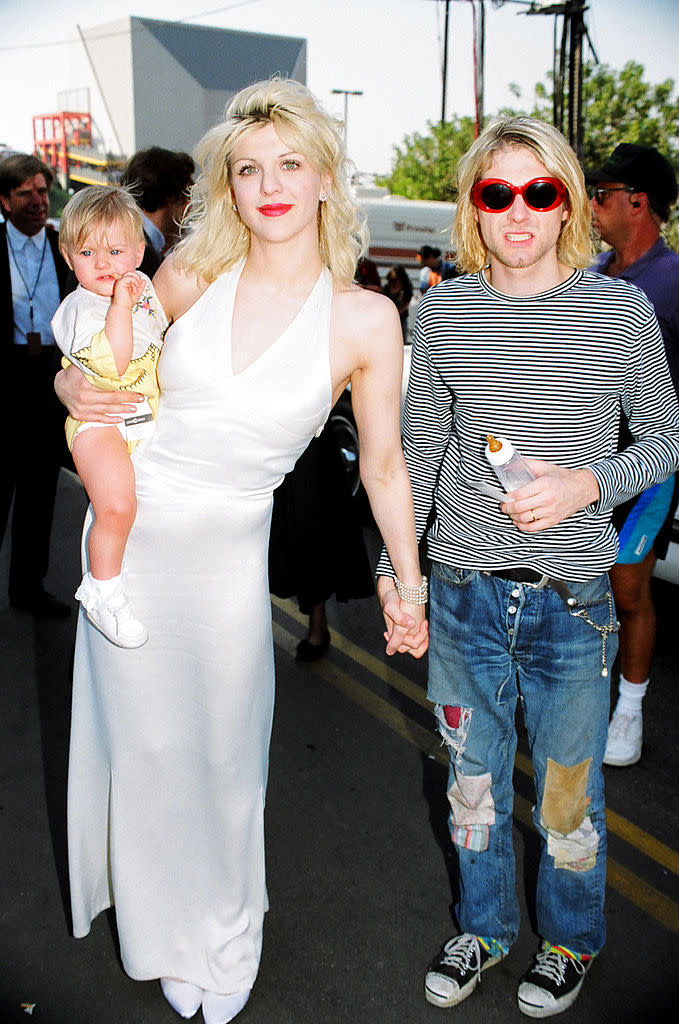 Courtney Love, Kurt Cobain and their daughter, Frances Bean, arrive at 1993 MTV Video Music Awards. (Photo: Jeff Kravitz/FilmMagic, Inc) 