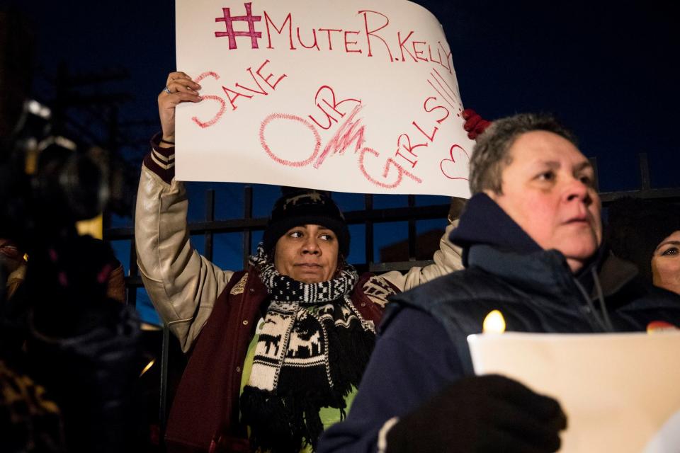 #MuteRKelly supporters protest outside R. Kelly's rented Chicago studio,  Jan. 9, 2019, in Chicago.