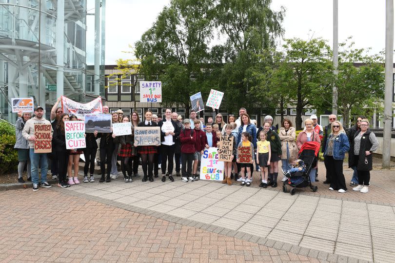 Parents and children protesting against the changes to free school transport -Credit:Stuart Vance/ReachPlc