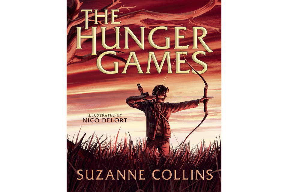This cover image released by Scholastic shows the illustrated edition of "The Hunger Games" by Suzanne Collins, with illustrations by Nico Delort. The illustrated edition will be published on Oct. 1, 2024. (Scholastic via AP)
