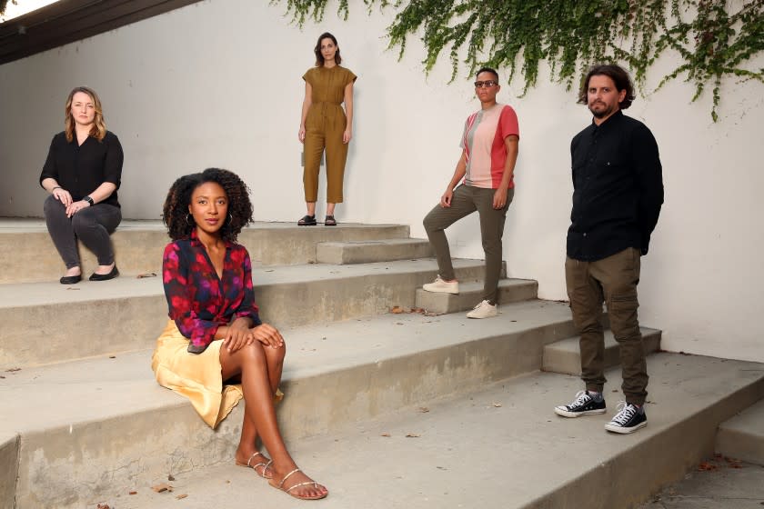 LOS ANGELES, CA - OCTOBER 02: Filmmakers Michelle Steffes, Alexis Jacknow, Alexandria Collins, Robin Cloud and Matt Bieler, left to right, pose for a portrait in Griffith Park on Friday, Oct. 2, 2020 in Los Angeles, CA. They are filmmakers from the 20th Century Digital Studios which is owned by Disney. (Dania Maxwell / Los Angeles Times)