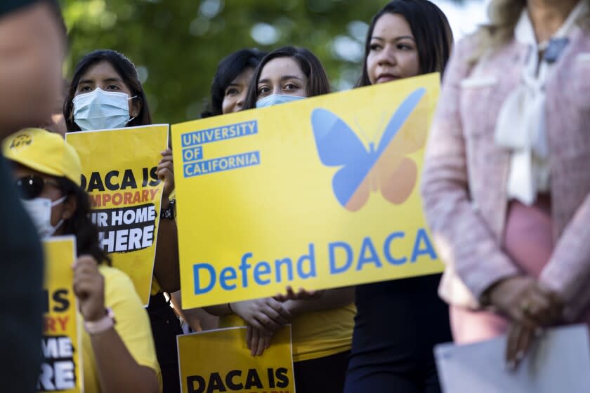 WASHINGTON, DC - JUNE 15: Activists listen during a news conference marking the 10th anniversary of the passing of Deferred Action for Childhood Arrivals (DACA), on Capitol Hill on Wednesday, June 15, 2022 in Washington, DC. The news conference comes just weeks before the Fifth Circuit Court of Appeals is slated to hear oral arguments in a case that will determine DACA's future viability, and is part of a larger fly-in of Dreamers, educators, and business leaders who will be meeting with their Members of Congress. (Kent Nishimura / Los Angeles Times)