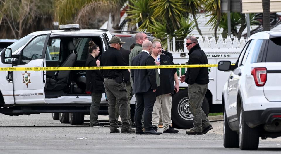 Investigators work Friday, February 3, 2023 on Avenue 308 in Goshen where one of two arrests were made for the January 16 homicide of six people nearby. The suspect was shot by an ATF agent but is expected to live. Another suspect was apprehended in Visalia, the other just blocks away from the crime scene. 