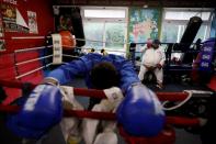 Boxer Farid Walizadeh rests during a training session in Lisbon