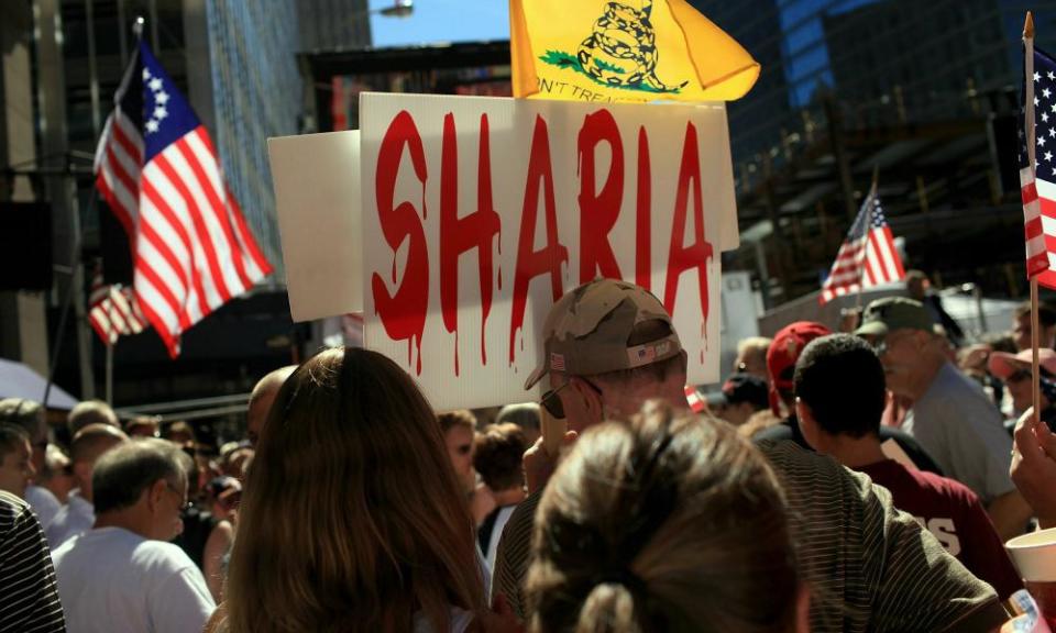 People demonstrate against allowing an Islamic community center near Ground Zero at a rally in lower Manhattan on 11 September 2010 in New York. The anti-sharia law movement became a force in the wake of the controversy.