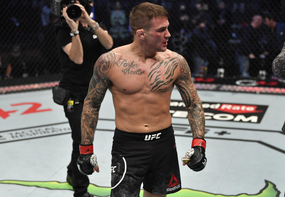 ABU DHABI, UNITED ARAB EMIRATES - JANUARY 23: Dustin Poirier reacts after his knockout victory over Conor McGregor of Ireland in a lightweight fight during the UFC 257 event inside Etihad Arena on UFC Fight Island on January 23, 2021 in Abu Dhabi, United Arab Emirates. (Photo by Jeff Bottari/Zuffa LLC)