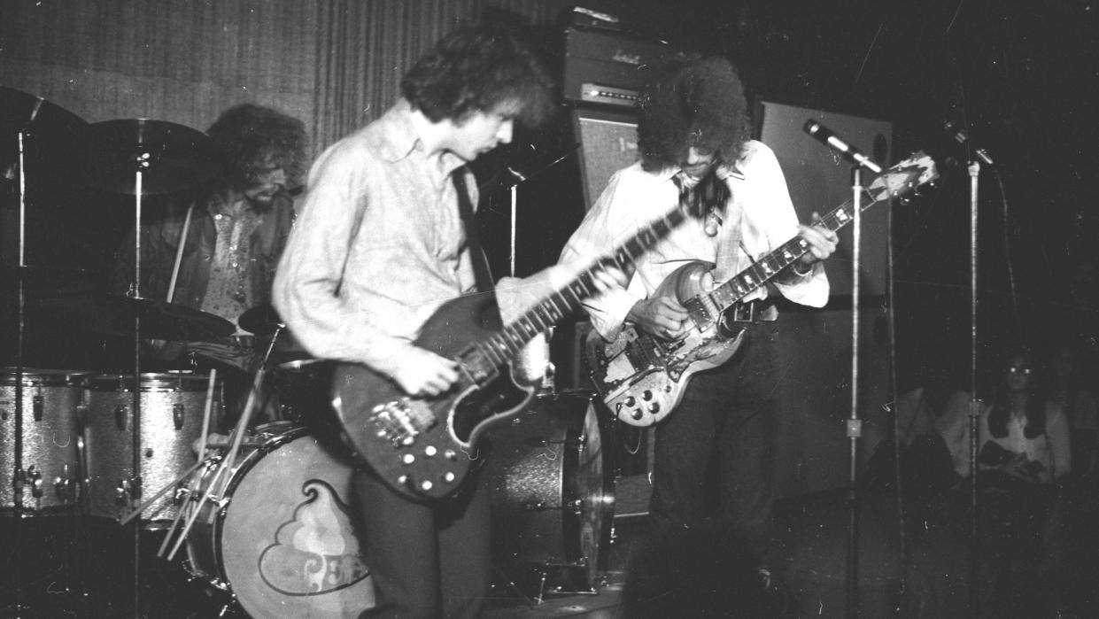  Jack Bruce (left), Ginger Baker, and Eric Clapton perform live at the Cafe Au Go Go in New York City in October 1967. 