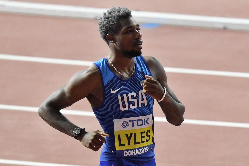 Noah Lyles, of the United States competes in the men's 200 meter heats during the World Athletics Championships in Doha, Qatar, Sunday, Sept. 29, 2019. (AP Photo/Martin Meissner)