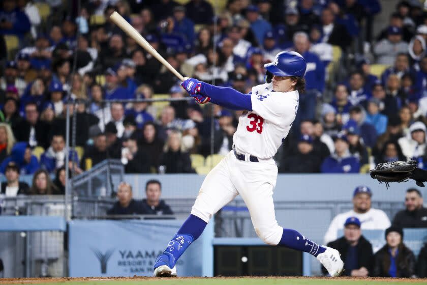 LOS ANGELES, CA - MARCH 30: Los Angeles Dodgers' James Outman hits a two-run home run during the sixth inning.