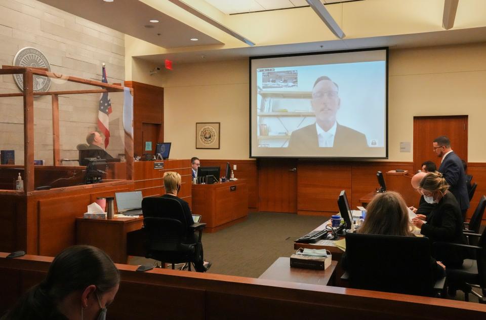 Dr. Timothy Ihrig, chief medical officer of Hospice and Community Care in Lancaster, Pa., testifies for the defense via video on Wednesday in Franklin County Common Pleas Court.