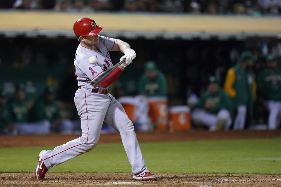 Los Angeles Angels' Max Stassi strikes out against the Oakland Athletics during the seventh inning of a baseball game in Oakland, Calif., Tuesday, Oct. 4, 2022. (AP Photo/Godofredo A. Vásquez)
