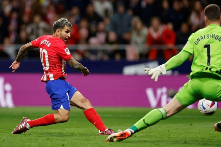 On target: Atletico Madrid's <a class="link " href="https://sports.yahoo.com/soccer/players/3900889/" data-i13n="sec:content-canvas;subsec:anchor_text;elm:context_link" data-ylk="slk:Angel Correa;sec:content-canvas;subsec:anchor_text;elm:context_link;itc:0">Angel Correa</a> scores his team's second goal (OSCAR DEL POZO)